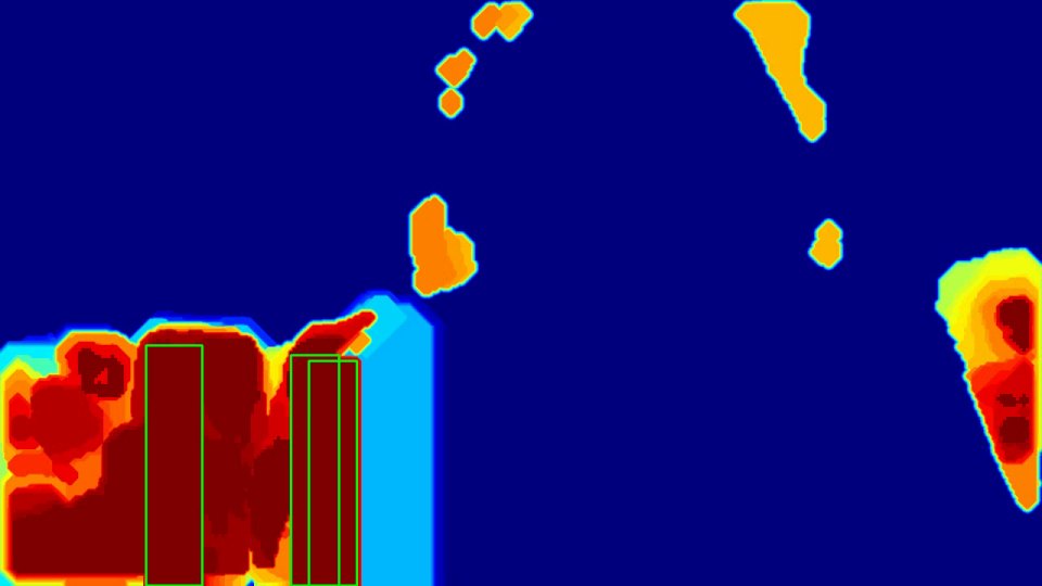 Motion heatmap: the moving people behind the presenter glow hot